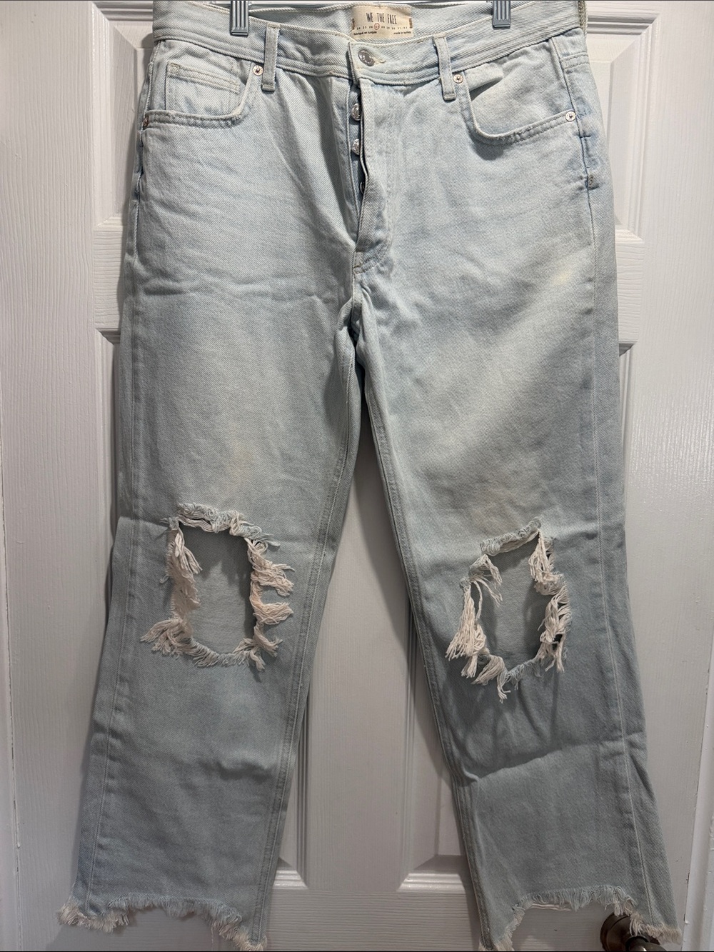 Free People We The Free distressed wide-leg cropped jeans; light wash size 27